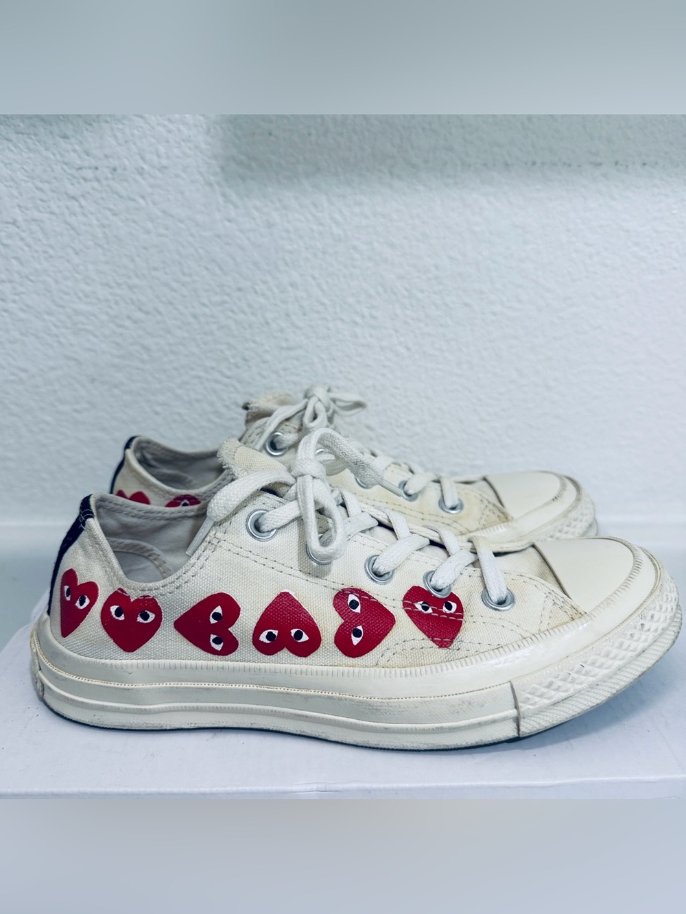 Comme des Garcons PLAY Off-White Canvas Low-Top Sneakers with Red Heart Motif